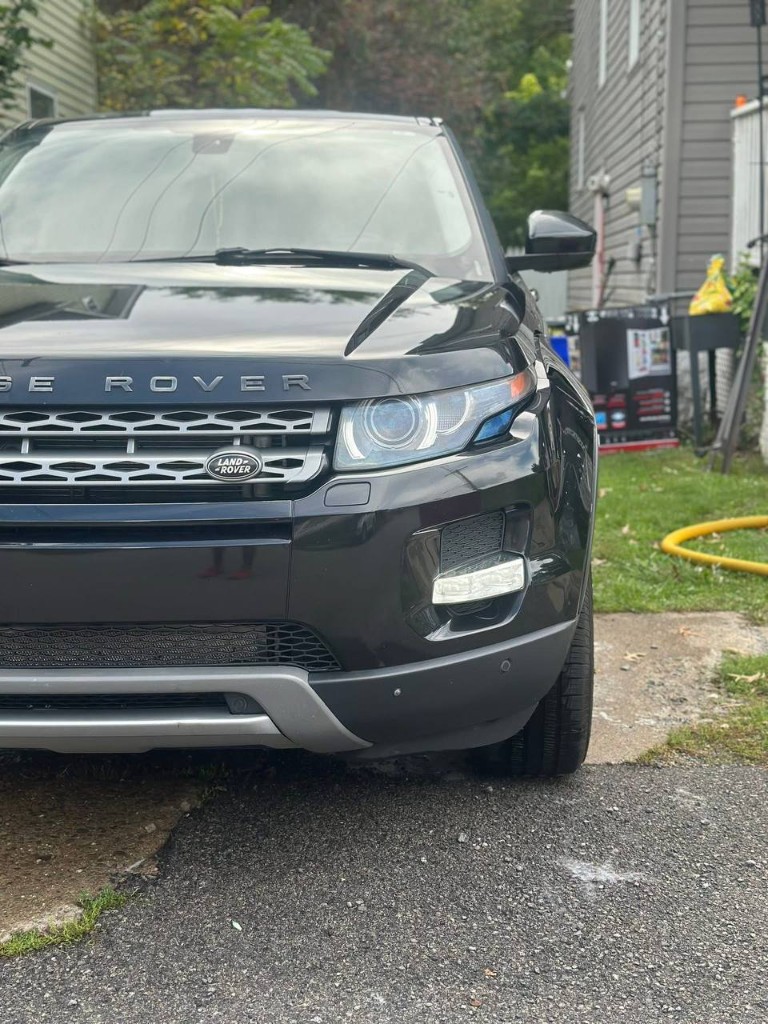 Black Range Rover after an exterior detail in New Castle